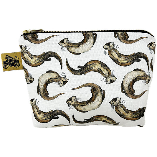 Otter Wash Bag, designed by Catherine Redgate.
100% cotton and lined with wipeable material, gold pull zip closure and gold bear on a bike Catherine Redgate tag.
Measuring approximately 15cm high, 21cm wide when lying flat with a gusseted 5cm depth to the base giving a triangular finish and a flat bottom.
Designed in Scotland.