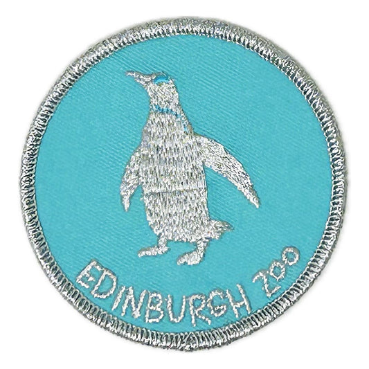 P..p..p..pick up a Penguin Patch with Edinburgh Zoo embroidery.
This fabulous Navy patch with silver embroidery can be ironed or sewn onto various materials.