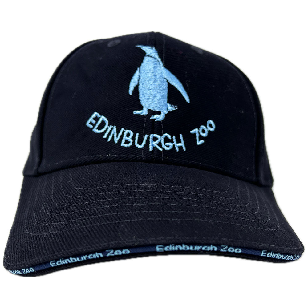 Be the coolest penguin in town with the Edinburgh Zoo Penguin Baseball Cap! This cap features penguin embroidery on the front, the back and branding around the cap peak. Show off your love for penguins while protecting your head from the sun. Perfect for zoo visits, outdoor adventures, or just adding some fun to your wardrobe.