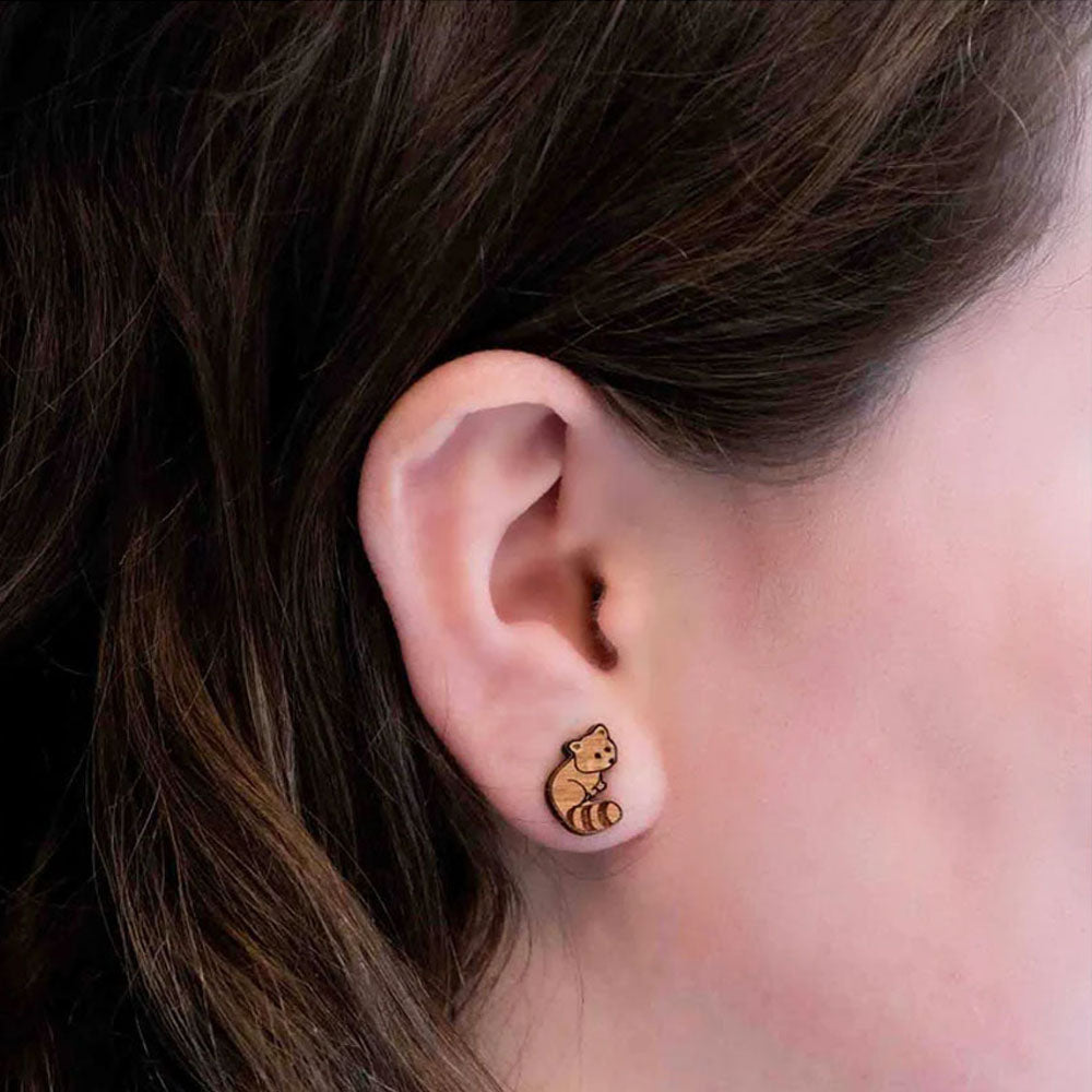 These Little Red Panda Cherrywood Earrings will make a statement without leaving a big pawprint. Perfectly petite at 1.1 x 1.2 cm, these delicate accessories are responsibly presented in eco-friendly packaging. Steal the spotlight with these unique and cute earrings!
Learn more about our Red Pandas here.