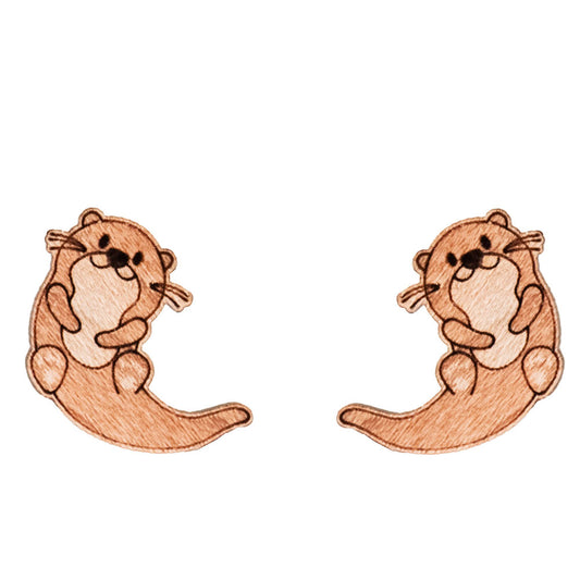 These Otter Cherrywood Earrings will make a statement without leaving a big pawprint. Perfectly petite at 1.2 x 1.3 cm, these delicate accessories are responsibly presented in eco-friendly packaging. Steal the spotlight with these unique and cute earrings!