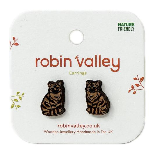 These Scottish Wildcat Cherrywood Earrings will make a statement without leaving a big pawprint. Perfectly petite at 1.3 x 0.9 cm, these delicate accessories are responsibly presented in eco-friendly packaging. Steal the spotlight with these unique and cute earrings!