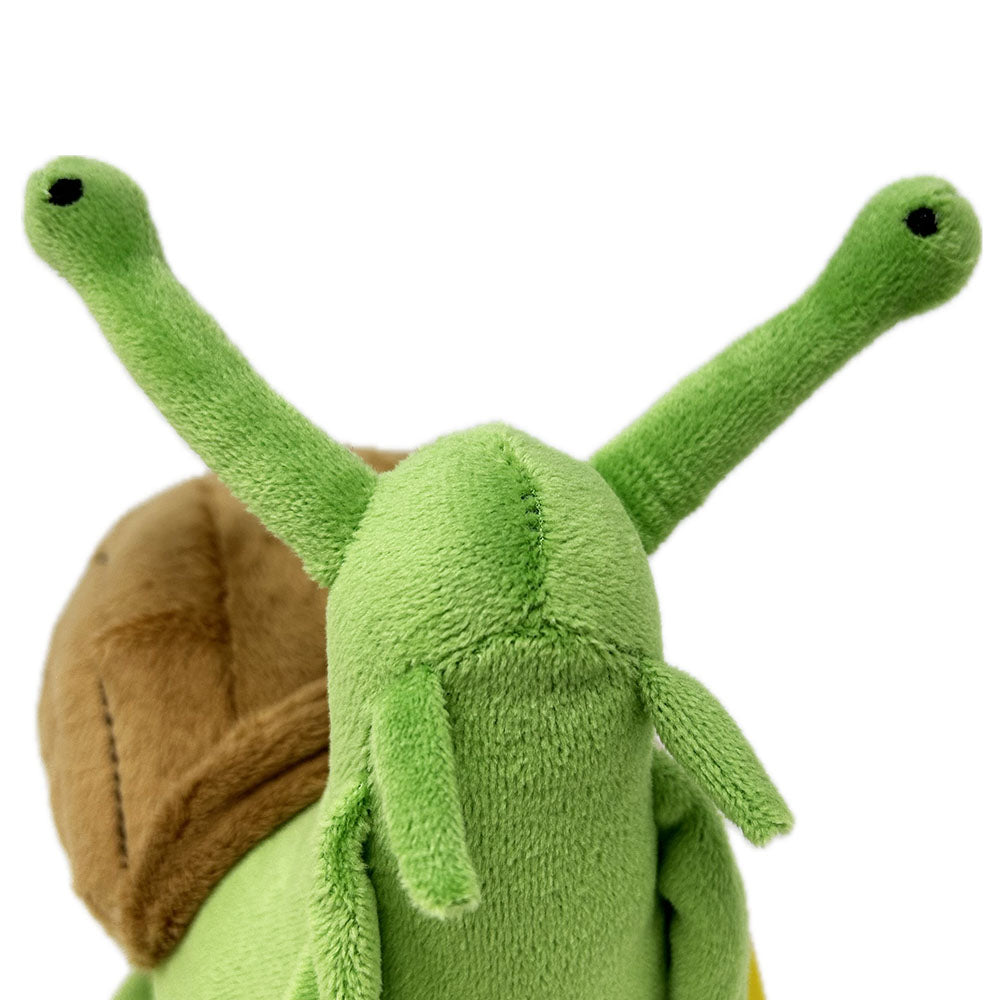 Get ready for some slow and steady fun with our Snail Soft Toy! Made with recycled stuffing, this snuggly snail is environmentally friendly and oh-so-soft. Perfect for cuddling or taking on adventures, this toy is sure to bring a smile to everyone's face. Suitable from birth. Wipe clean only.