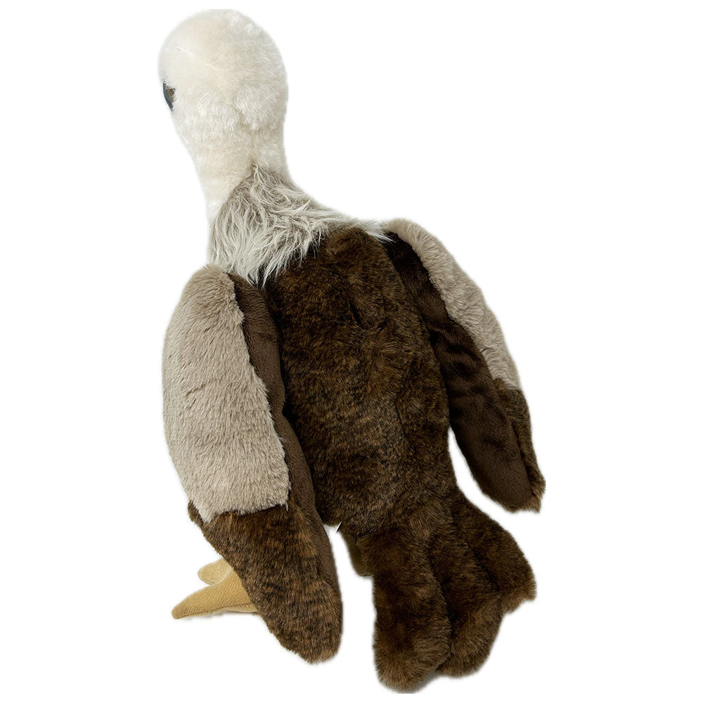 This Vulture soft toy has a luscious plush body, extra thick plush hackle, felted feet and shiny safety eyes. This infamous bird looks super cute with realistic beak and feet.
Eco friendly made with recycled plastic bottles, extra fun for cuddles while staying environmentally friendly.
Vultures often get a bad reputation but they are not bad. Like every creature, they play an important role in our eco system. Some people think of them as natures cleaners.
35cm tall
Suitable from birth.
Hand Wash