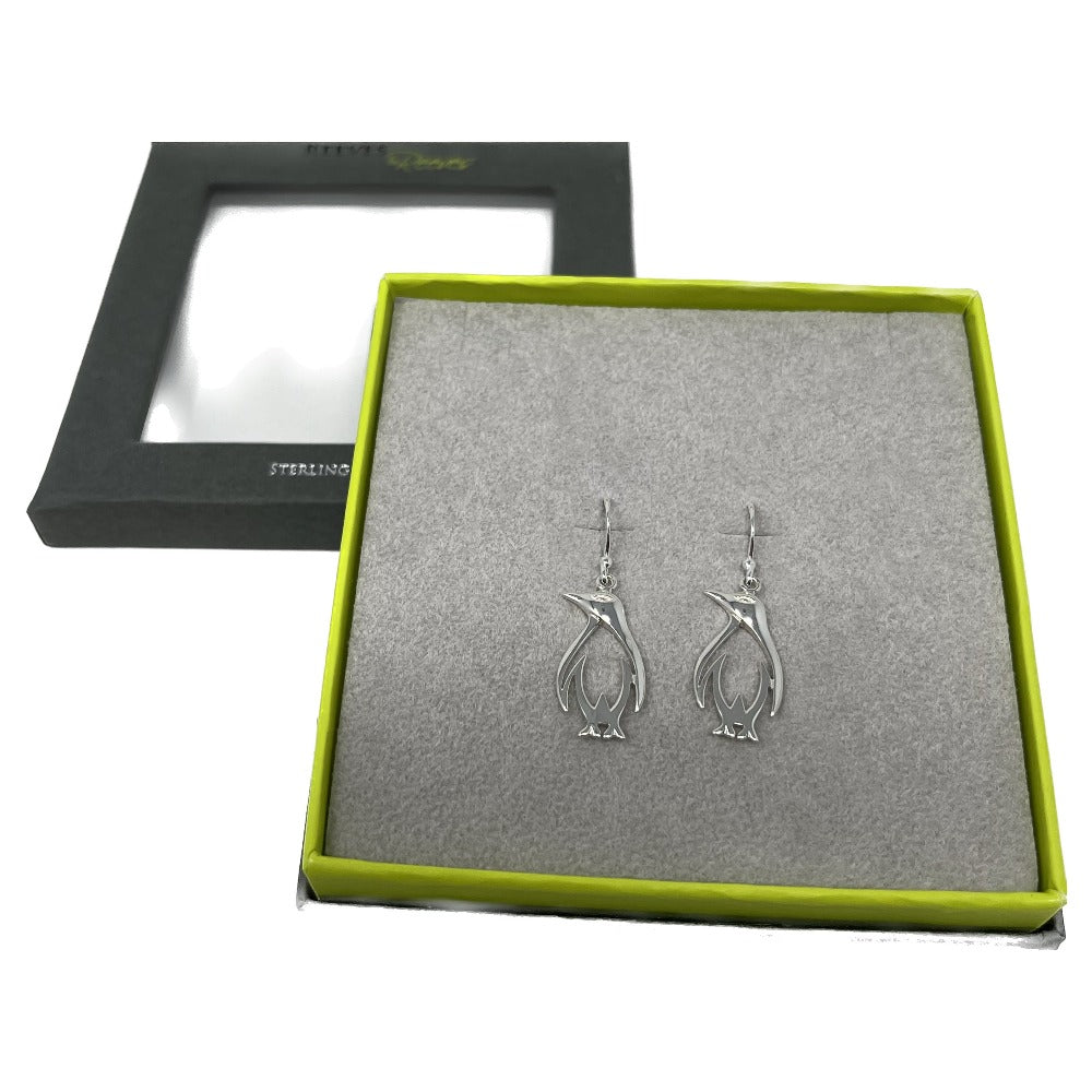Reeves & Reeves Sterling Silver Penguin Drop Earrings, made exclusively for RZSS. Certainly a real eye catcher, and perfect for the socialite who likes to stand out from the crowd! Made from high quality sterling silver, the beautifully crafted penguins have exquisite detailing, so lifelike and loveable, and with their striking sharp detail they are sure not to be missed! The penguins hang from sterling silver hooks which dangle perfectly from the ear, so loveable and really make us smile.
