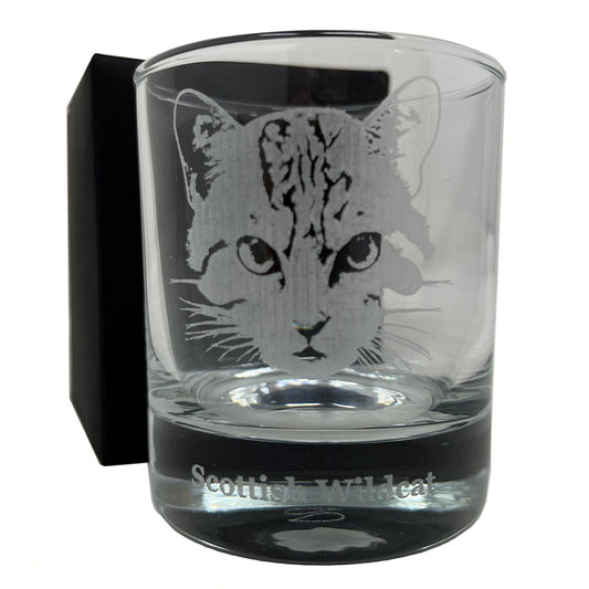 Heavy base tumbler whisky glass from RZSS with Scottish Wildcat etching. A beautifully balanced glass standing 8cm high with a 6.5cm diameter. Presented in recyclable gift box.