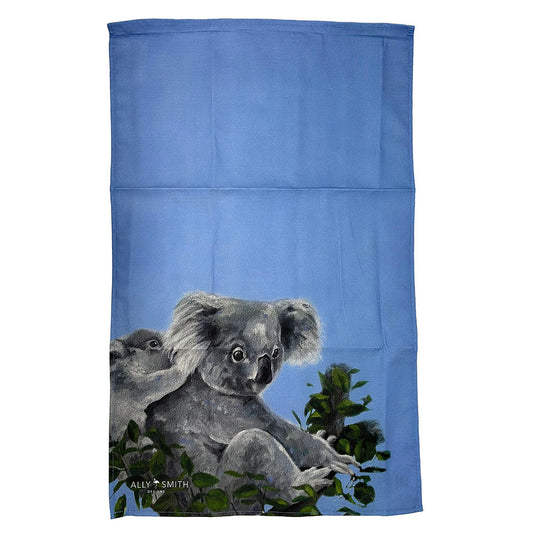 Ally Smith is a local Edinburgh based artist who has always been inspired to paint nature. Ally paints in contemporary bright, bold colours, creating characterful animal studies.  This image of a mother and baby Koala was based on one of Ally's many happy family visits to Edinburgh Zoo, to visit the new joey.&nbsp;  This Koala Tea Towel is 100% cotton and machine washable at 30 degrees.