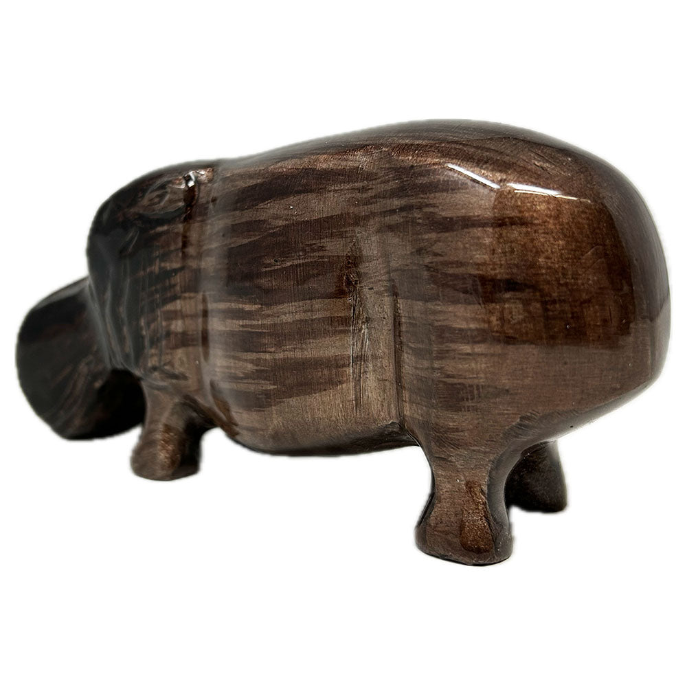 This Brushed Brown Hippo is not only lovely to look at but also eco friendly, made from recycled aluminium&nbsp;

The hippo is Fair Trade and hand made by Indian artisans.&nbsp; The hippos are cast, then rough polished and enamelled before being beautifully finished with a smooth polish.&nbsp; Every one of these items is individually made to the very highest quality with a hand finished colour enamel.&nbsp;&nbsp;The translucent colour is rich and deep, through to the recycled aluminium beneath.

These stunn