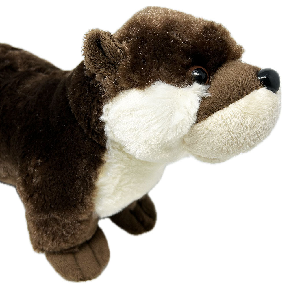This otter soft toy by Ravensden is soft and very huggable. The toy has a full plush body, a long tail and hard eyes.   30cm long (including tail)  Suitable from birth.  Hand Wash