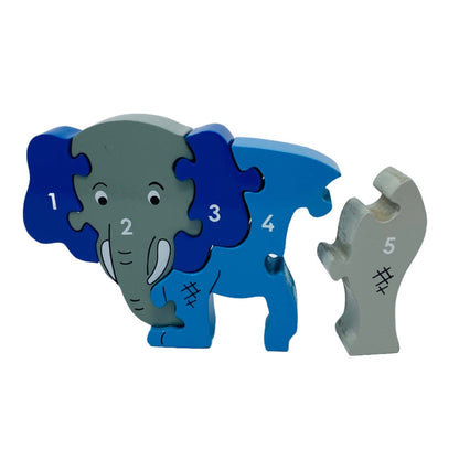 This wooden Elephant jigsaw is the ideal toy to be able to learn through playing. The jigsaw consists of five chunky pieces, is 25mm thick and can free stand when completed.  This fair trade wooden jigsaw puzzle is handcrafted by skilled individuals in Sri Lanka from MDF and nontoxic Paints.  Suitable for 10 months and above.