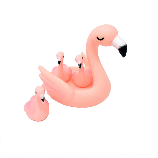 This flamingo family bath toy set is a great gift to ensure a fun bath time! Comes complete with large flamingo and three small.   Dimension: 18cm length. 