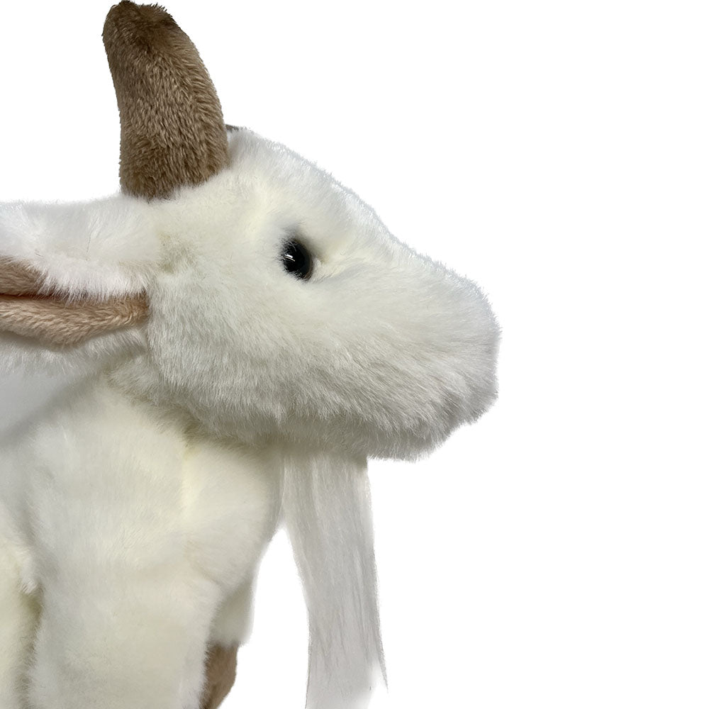 This Goat soft toy by Ravensden is soft and very huggable. The toy has a full, soft plush body, felt hooves and horns and shiny safety eyes. Floppy tulip ears and shaped hooves made this mountain climber utterly adorable. Eco friendly stuffing, made with recycled plastic bottles.