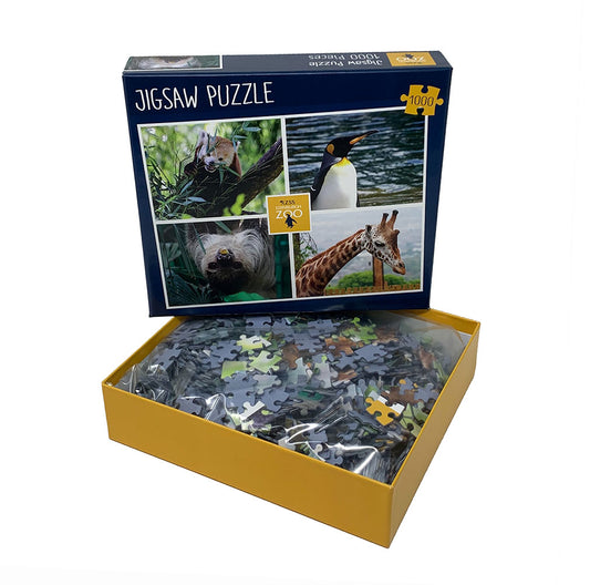Edinburgh Zoo Jigsaw Puzzle featuring 4 of our fabulous animals. A cheeky red panda, king penguin, two toed sloth and a giraffe.  Made from recycled board this 1000 piece game will keep you entertained while staying eco friendly. Comes in a display box and contains a large image for reference.  66 x 50cm (26 x 20")   