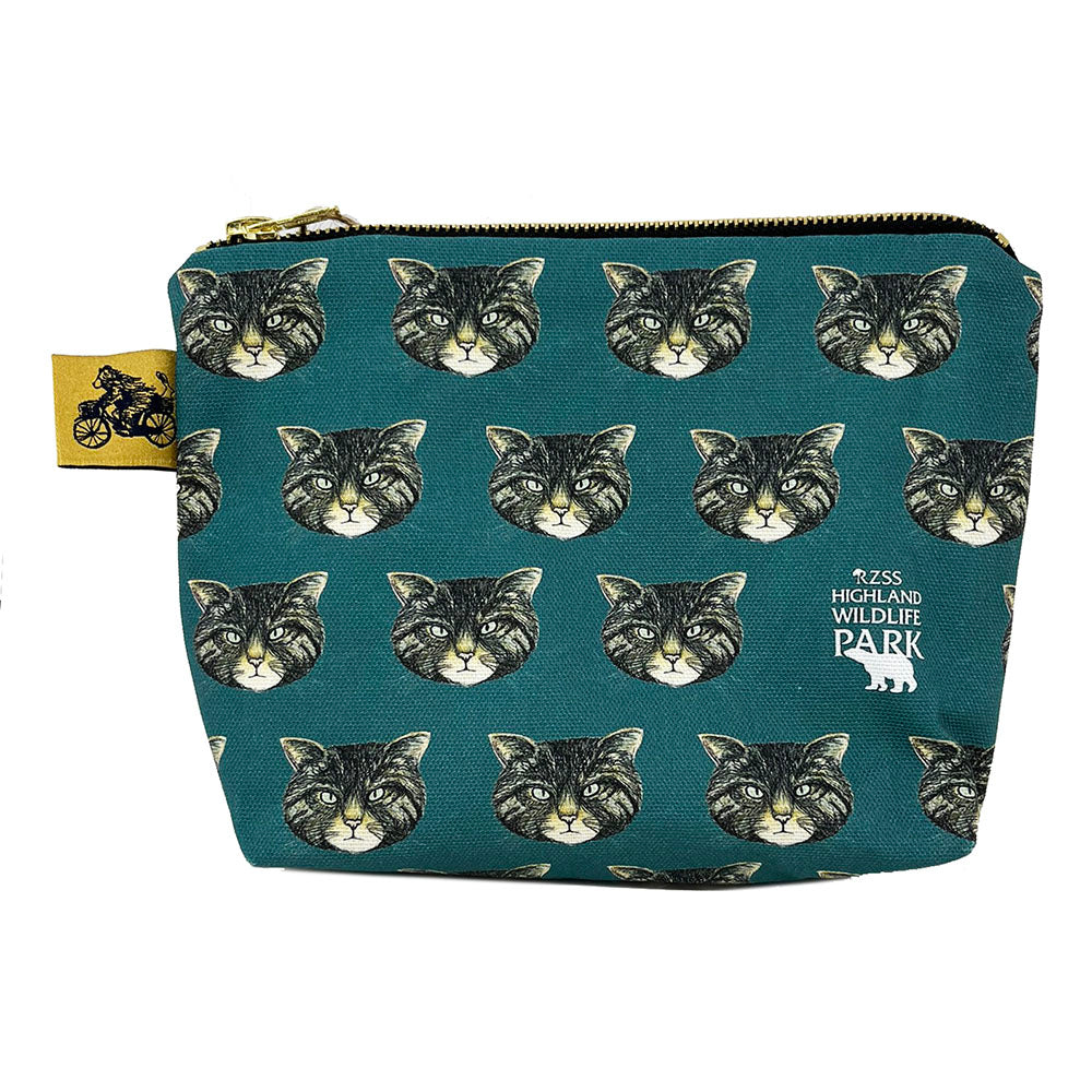 Wildcat Wash Bag, designed by Catherine Redgate exclusively for the Highland Wildlife Park. 100% cotton and lined with wipeable material, gold pull zip closure and gold bear on a bike Catherine Redgate tag. Measuring approximately 15cm high, 21cm wide when lying flat with a gusseted 5cm depth to the base giving a triangular finish and a flat bottom. Designed in Scotland.